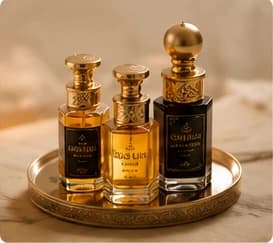 Three luxury glass attar perfume bottles